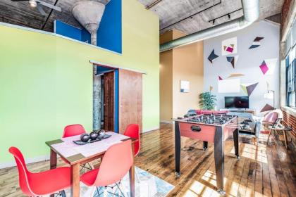 TWO Stunning Industrial Lofts by CozySuites - image 6