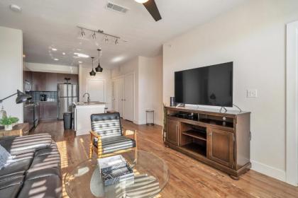 Curated Comfort with Riverwalk Access and Resort Style Pool - image 3