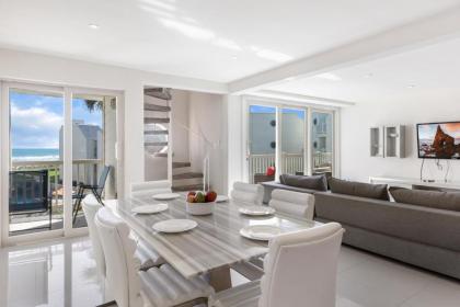 Rise and Sea! Beachfront condo in exclusive resort Spectacular shore views and landscapes! - image 2