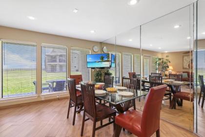 NEW LISTING! Ground floor beachfront beauty! Steps to the beach and pool - image 5