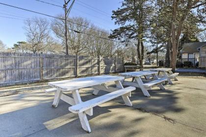 Cozy Condo with Private Deck Walk to Beach and Dining - image 11