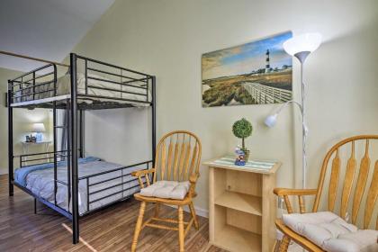 Cozy Condo with Private Deck Walk to Beach and Dining - image 13