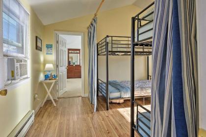 Cozy Condo with Private Deck Walk to Beach and Dining - image 3