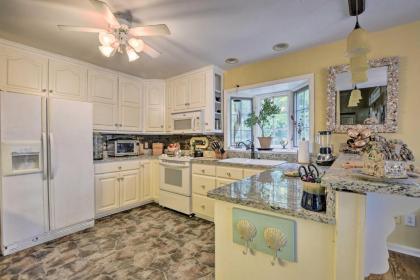 Cottage Garden Home with Screened Patio and Yard! - image 11