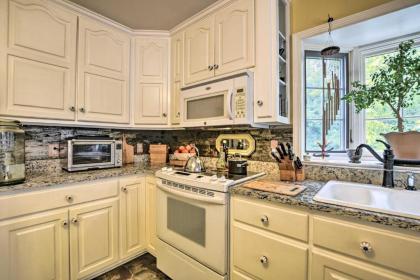 Cottage Garden Home with Screened Patio and Yard! - image 14