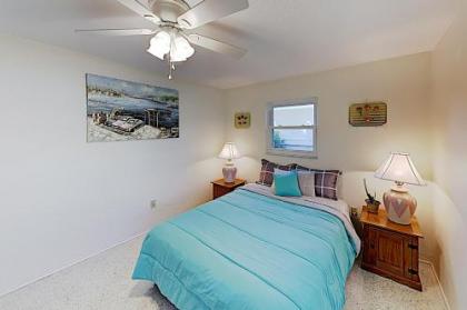 New Listing! Canal-Front Escape with Private Yard home - image 2