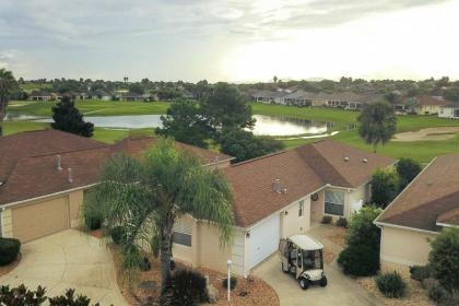 House on Golf Course   2 half miles to Lake Sumter the Villages Florida