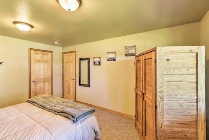 Quiet Trego Resort Cabin with Lake Pavilion and Trails - image 1
