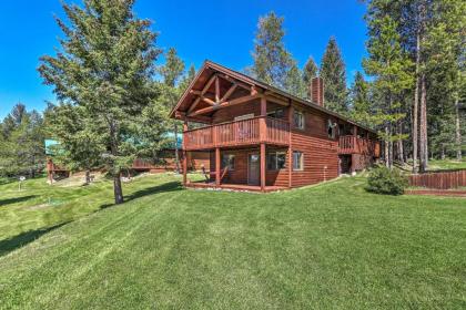 Quiet Trego Resort Cabin with Lake Pavilion and Trails - image 4